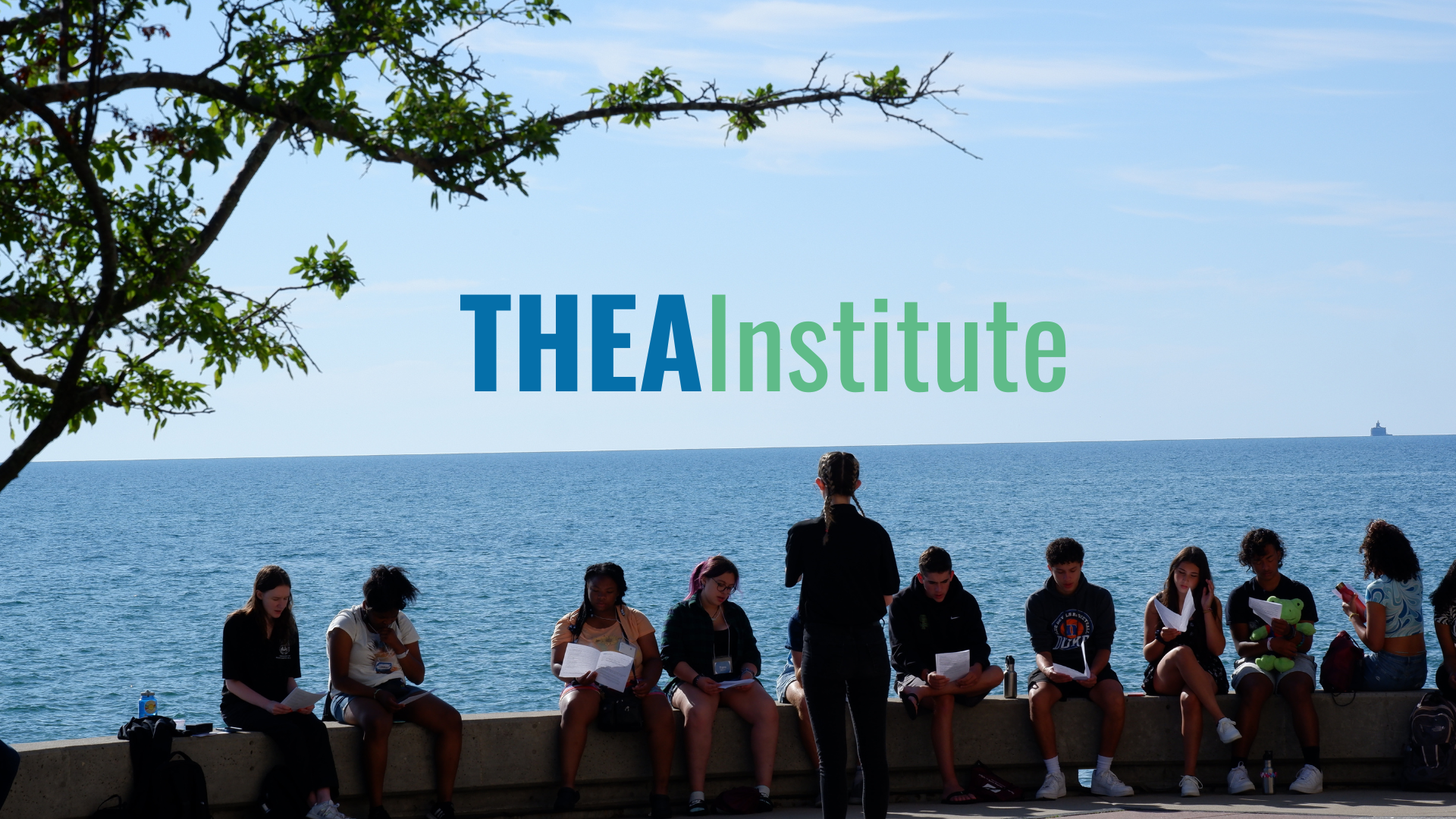 Students gather by Lake Michigan on Loyola Chicago's campus